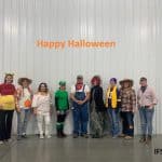 Picture of several IFS employees dressed up in costume for Halloween 2019